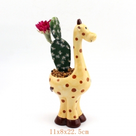 Planteur de girafe en céramique mignon rempli de fleurs
