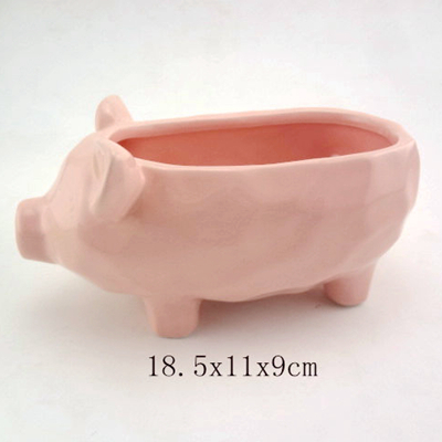 Pink terracotta pig planter