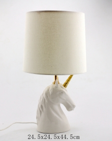 lampe de table en céramique blanche licorne
