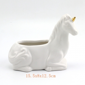 white ceramic unicorn piggy bank