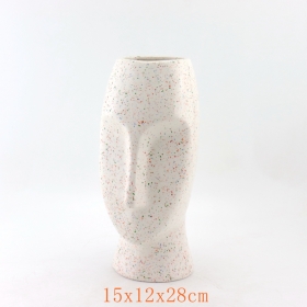 vase en terre cuite avec visage de zara home style